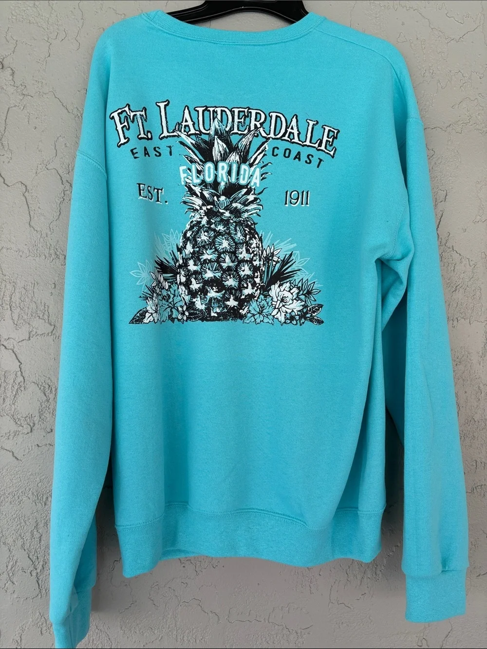 Jerzees Turquoise Crewneck Sweatshirt with Fort Lauderdale Pineapple Graphic